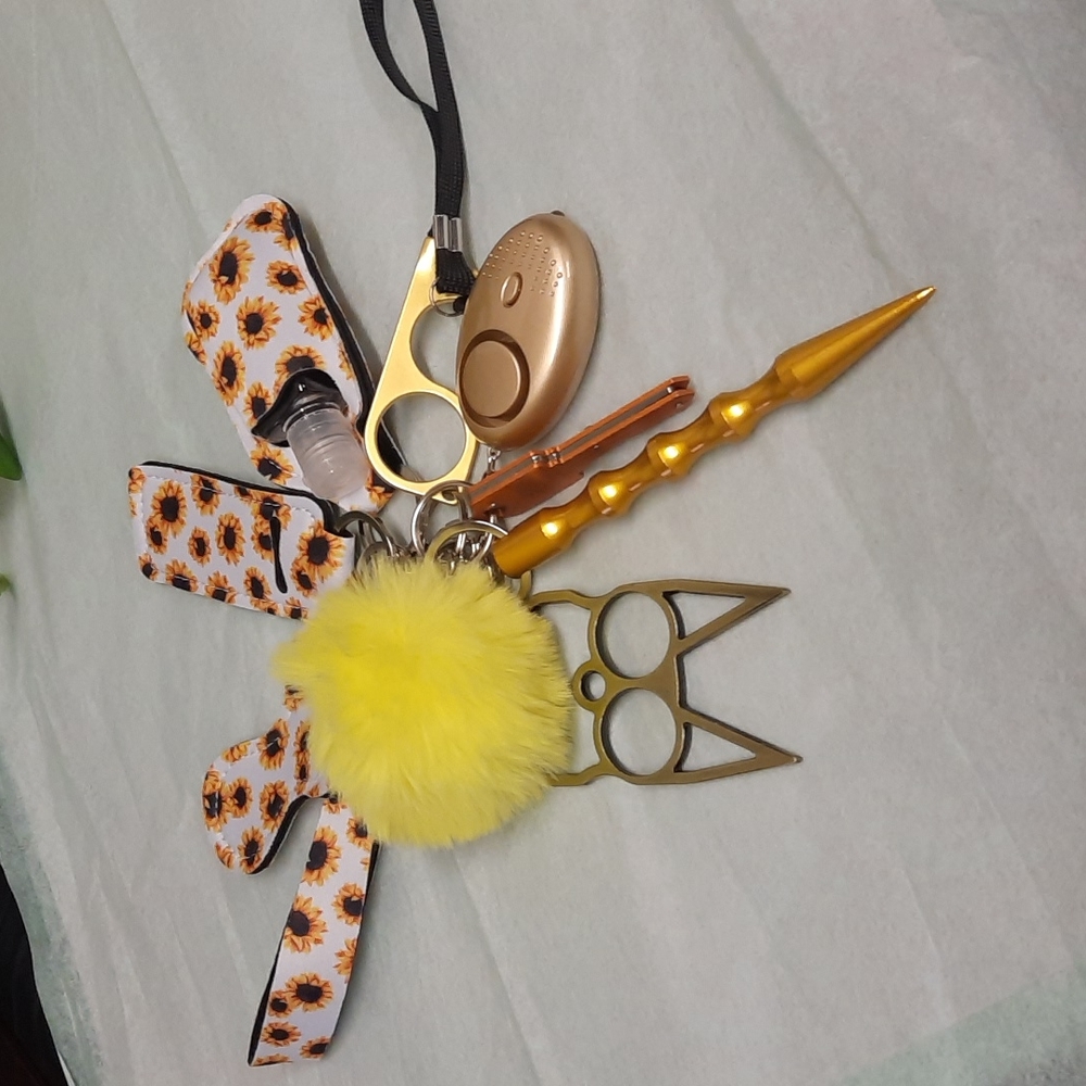 Self defense sunflower white keychain